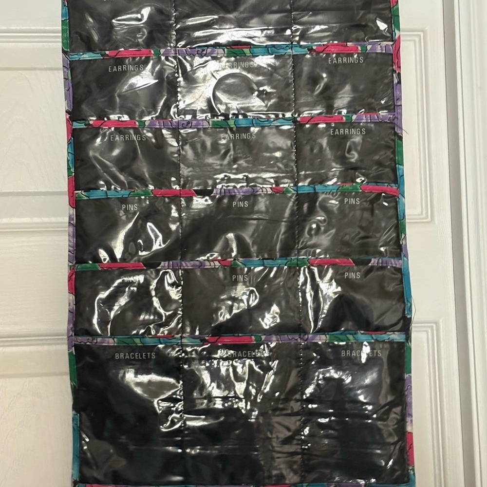 Claire's Black Jewelry Organizer with Pink, Teal, Purple Trim, both side pockets